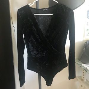 Long sleeve, black velvet Fashion Nova bodysuit.